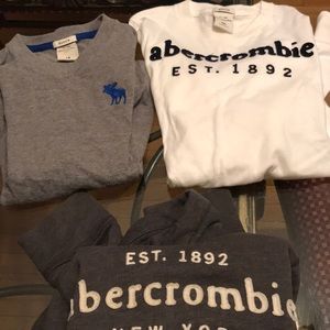 Three Abercrombie shirts.